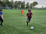 Laatste training S.K.N.W.K. JO11-1JM (partijtje tegen de ouders) van maandag 27 mei 2024 (123/137)